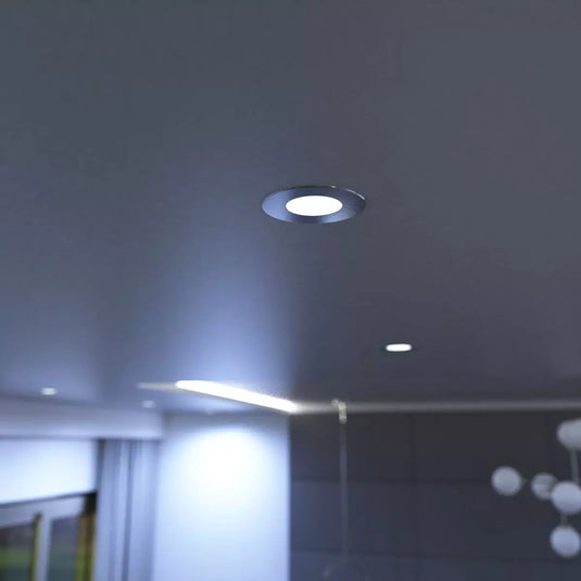 Mounted cool white brushed chrome downlight