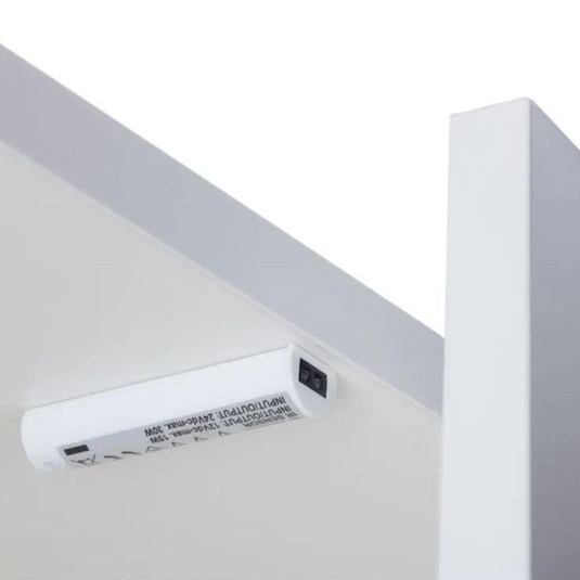 Door and swipe sensor fitted in a cabinet