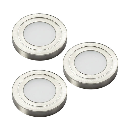 Three natural white cabinet lights in brushed nickel
