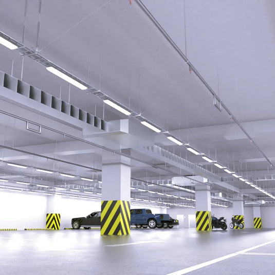 NCF IP65 LED Batten, with Emergency Module and Sensor, in cool white light inside parking lot setting