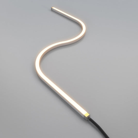Neon flex bent into an S curve with its cable