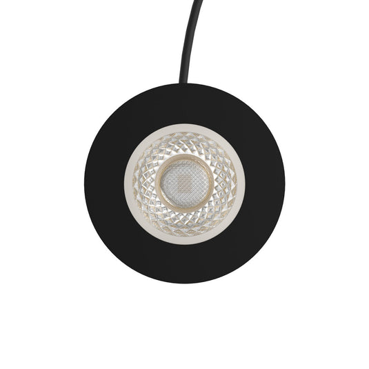 Top of a black 65mm ground light