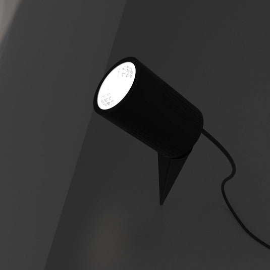 Black spike light lit, close up
