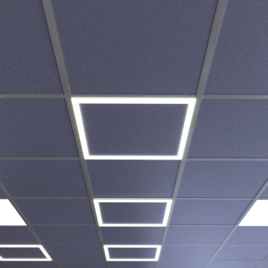 Cool white edge lit panels in a ceiling, mid shot