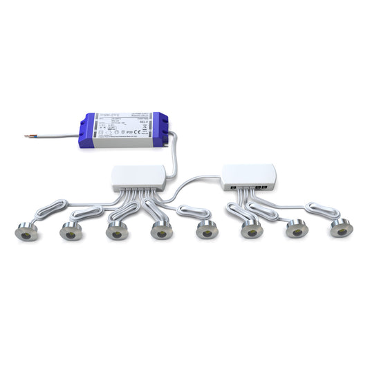 Eight brushed chrome LED plinth lights with their driver