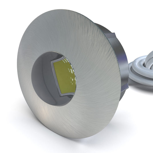 Side of a brushed chrome plinth light