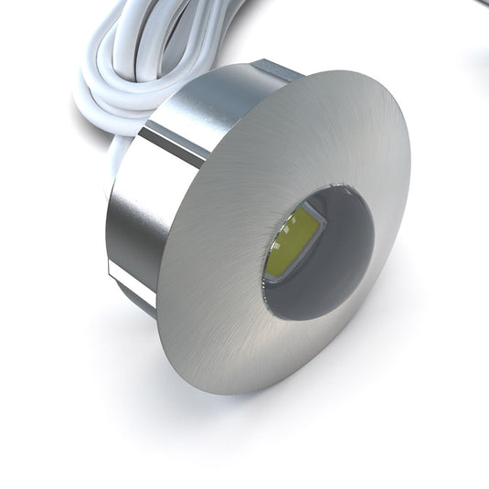 Side view of a brushed chrome plinth light