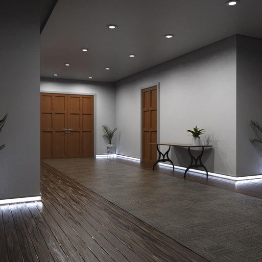 Entryway with white skirting profile lit in cool white