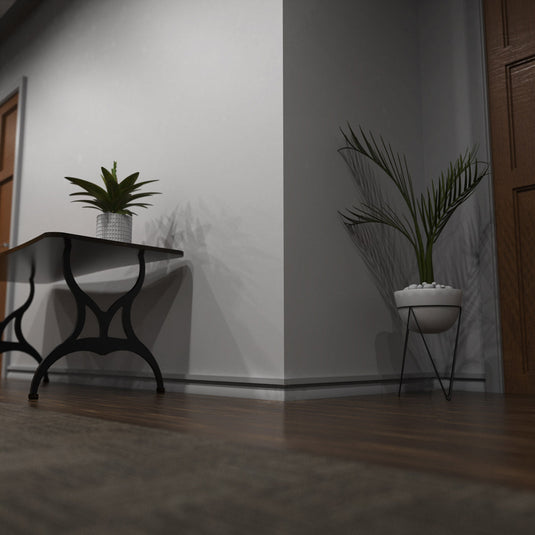 Close up of white skirting profile in a hallway