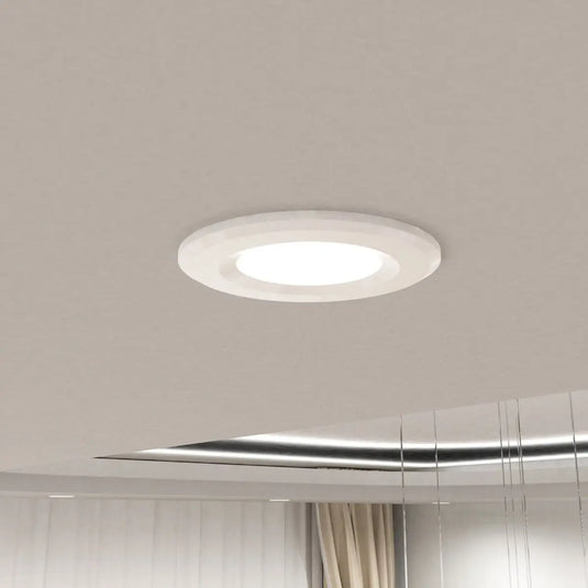 Fixed, Fire Rated LED Downlight - White Bezel mounted in ceiling