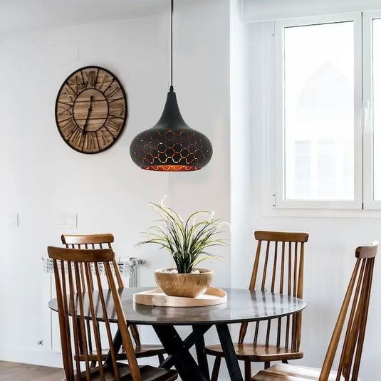 Black LED Pendant Light, Hanging With Gold Inside on top of the dining table setting