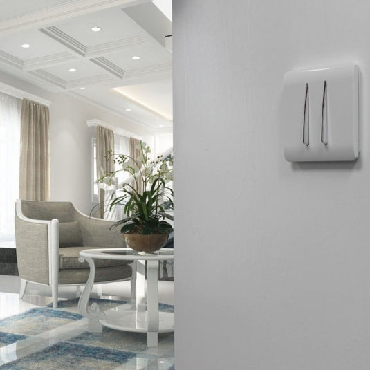 White 2 gang light switch fitted to a wall