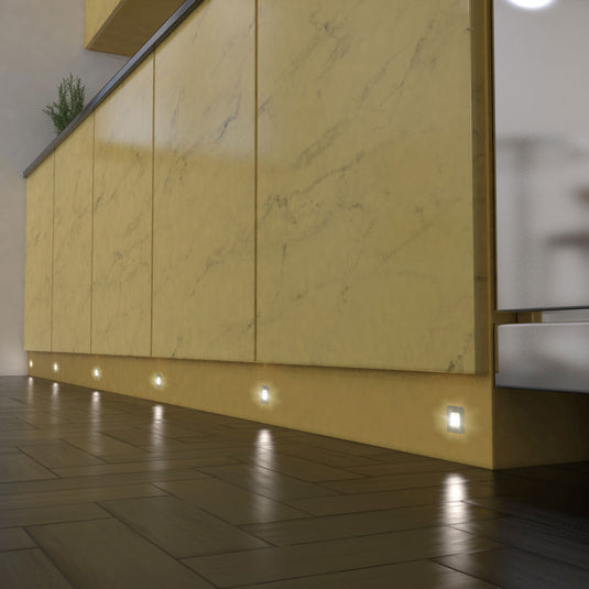 Plinth lights glowing natural white at floor level