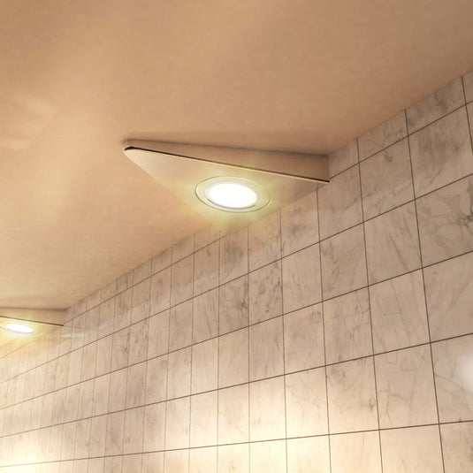 Close view of warm white triangle cabinet lights in a kitchen