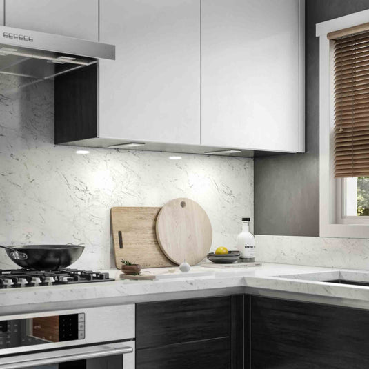 mid closeup of a natural white light under cabinet in a kitchen