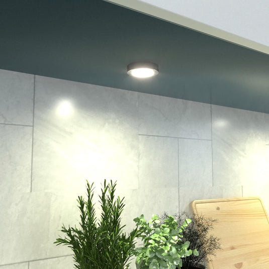 installed surface mounted under cabinet light with warm white light