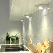 mounted triangle under cabinet lights with warm white light