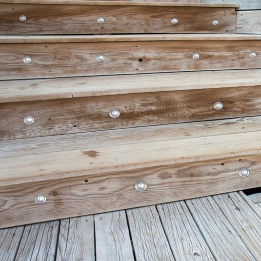 wood stairs with deck lights