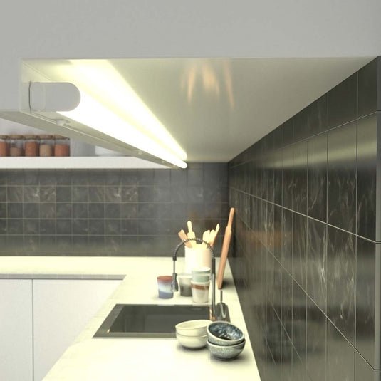 kitchen with linkable LED under cabinet lighting in warm white light