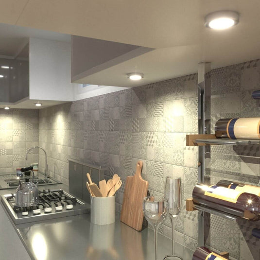 kitchen with surface mounted under cabinet light in warm white light