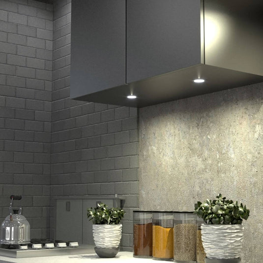Under cupboard light in brush chrome with warm white light  installed in a kitchen